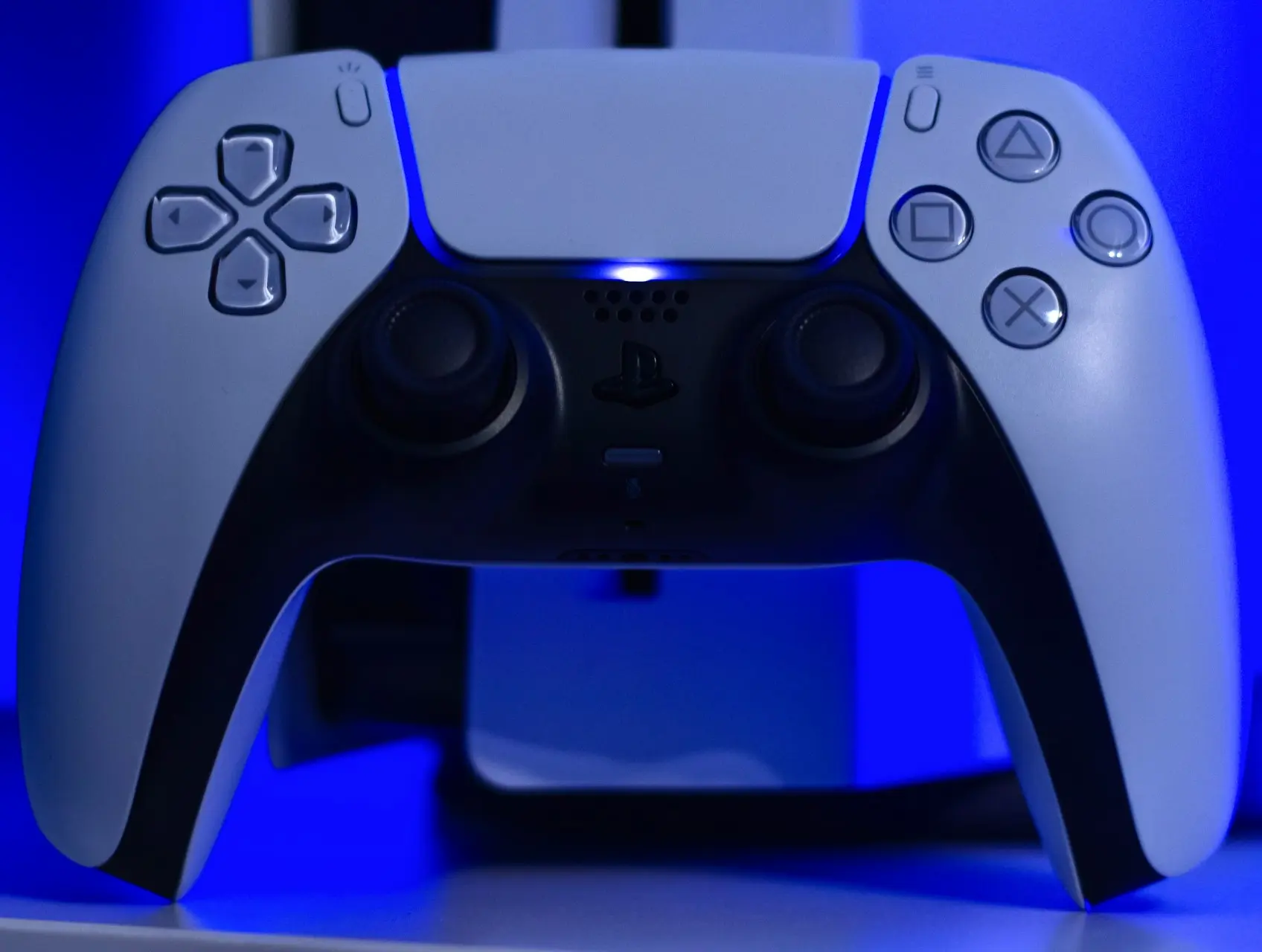 blue and black game controller